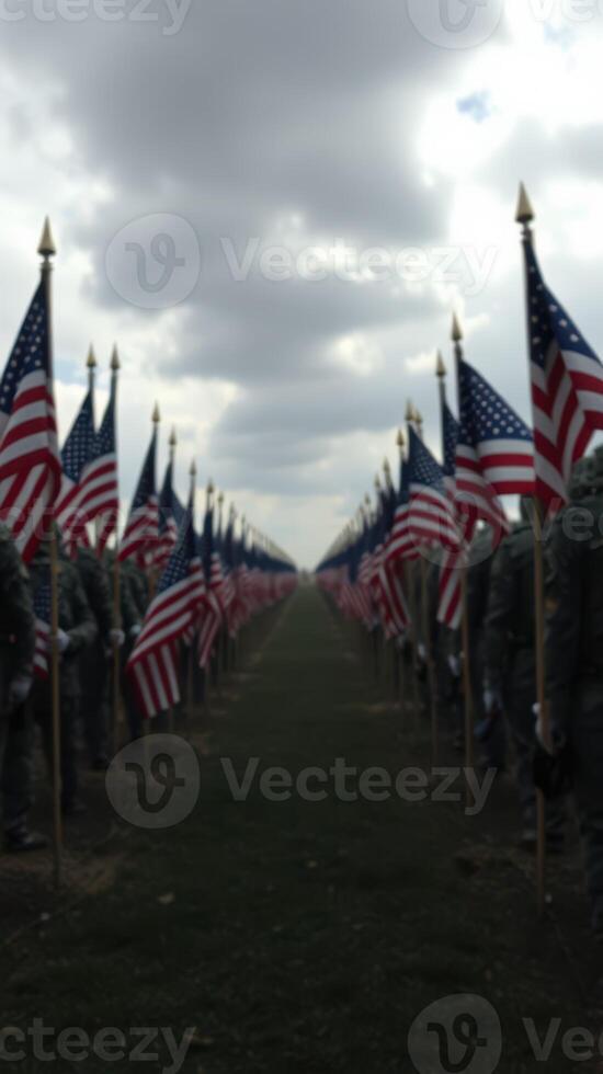 Soldiers standing in formation with American flags under a cloudy sky during a memorial event photo