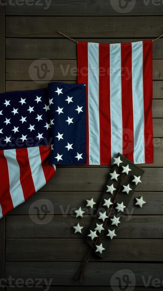 Stars and stripes decor displaying American flags and a star accent on wooden background for patriotic celebrations photo