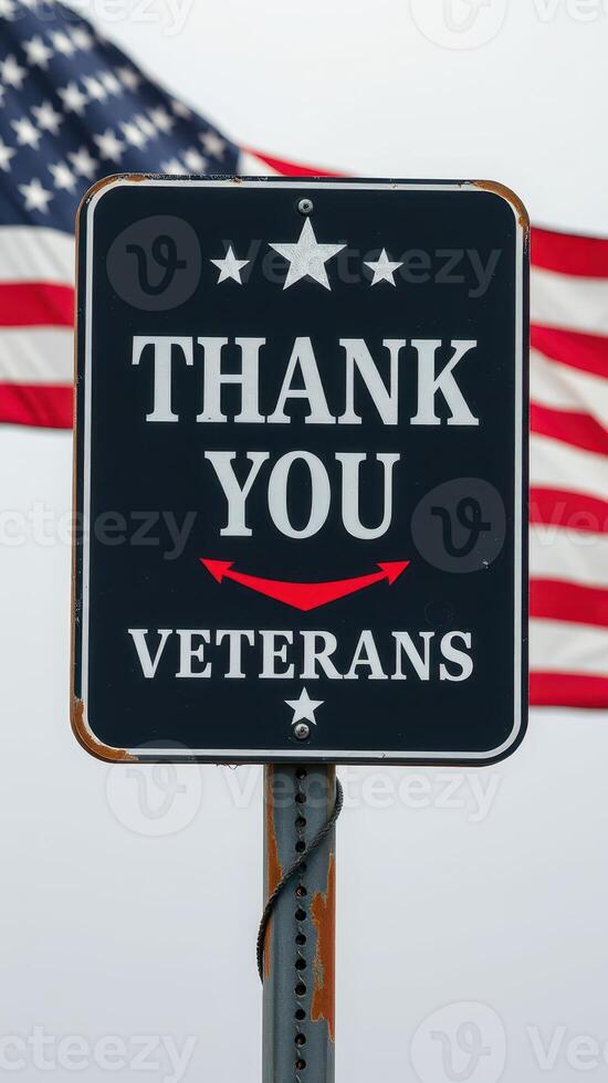 Veterans Day celebration with sign of appreciation and American flag waving in the background photo