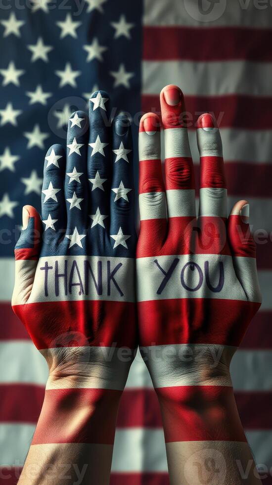 Hands painted in American flag colors expressing gratitude against a flag backdrop photo
