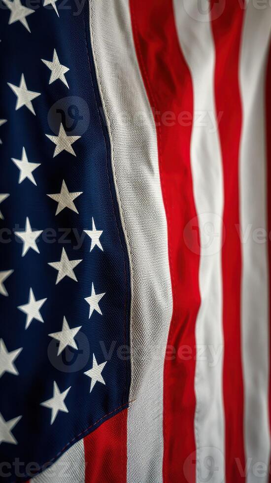 Close-up view of American flag showcasing vibrant colors and distinct patterns of stars and stripes photo