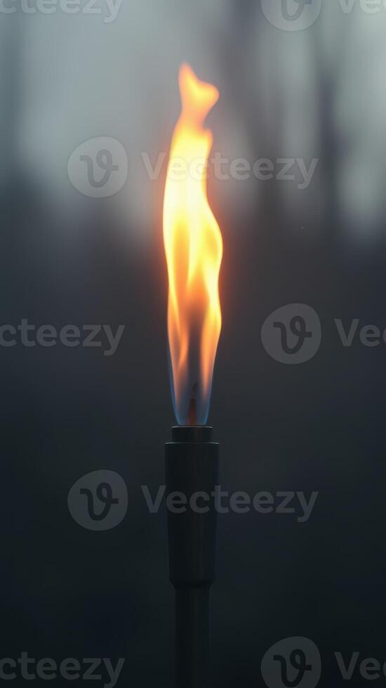 Flame flickers in the dark at twilight gathering, illuminating the surrounding haze of the evening landscape photo