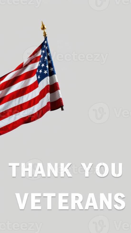 Flag waves honorably with a heartfelt message to veterans in a simple, striking composition photo