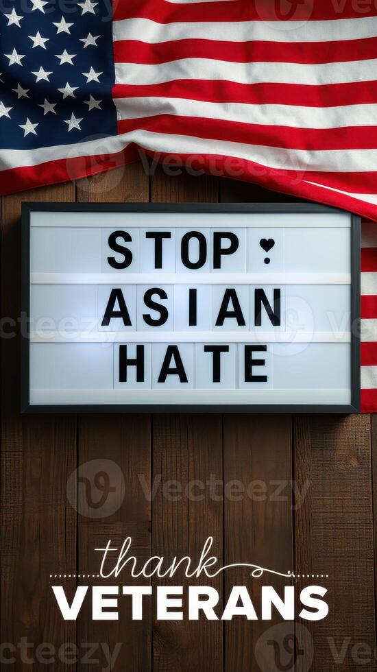 Message promoting unity against hate displayed with American flags and a wooden background photo