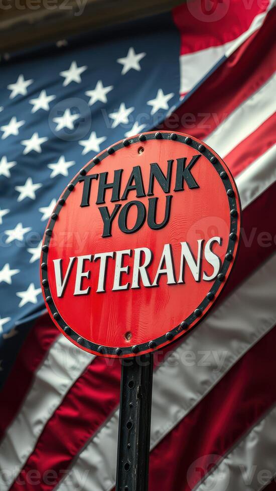 Sign displaying gratitude for veterans against a backdrop of the American flag photo