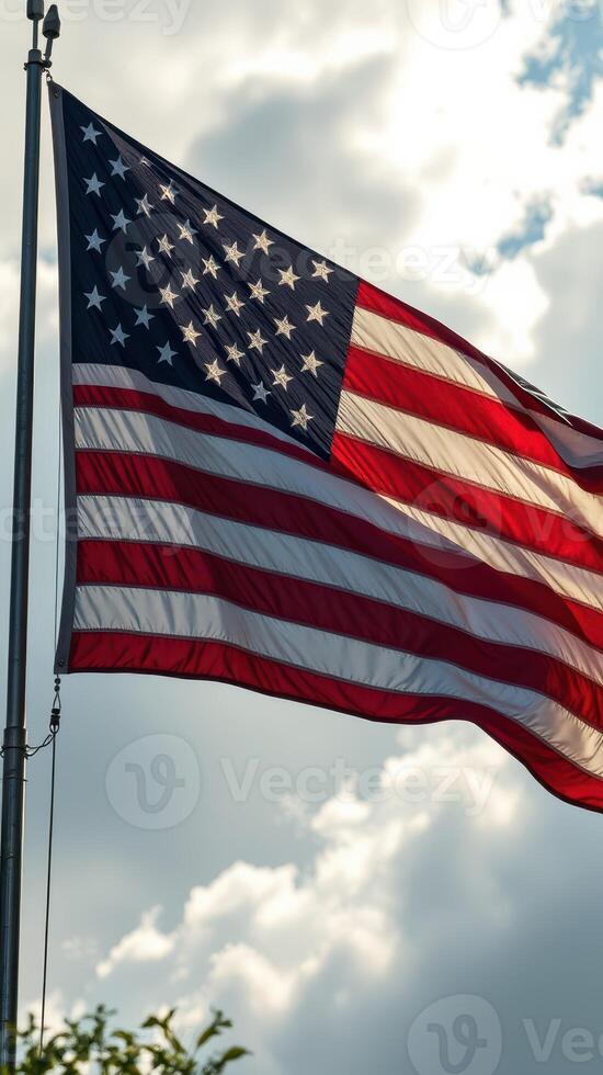 Flag waving against a cloudy sky at a local park during the afternoon photo