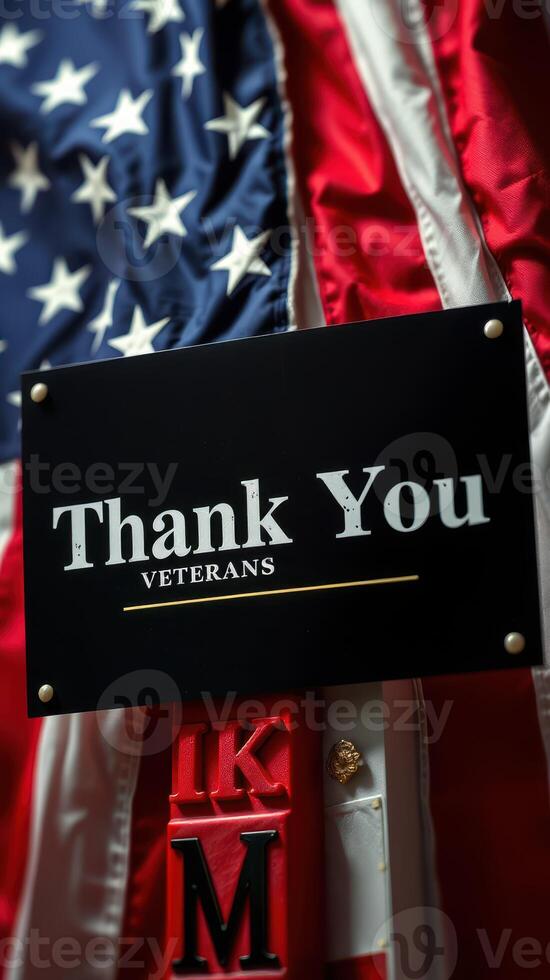 Recognition for veterans with a thank you sign displayed alongside an American flag photo