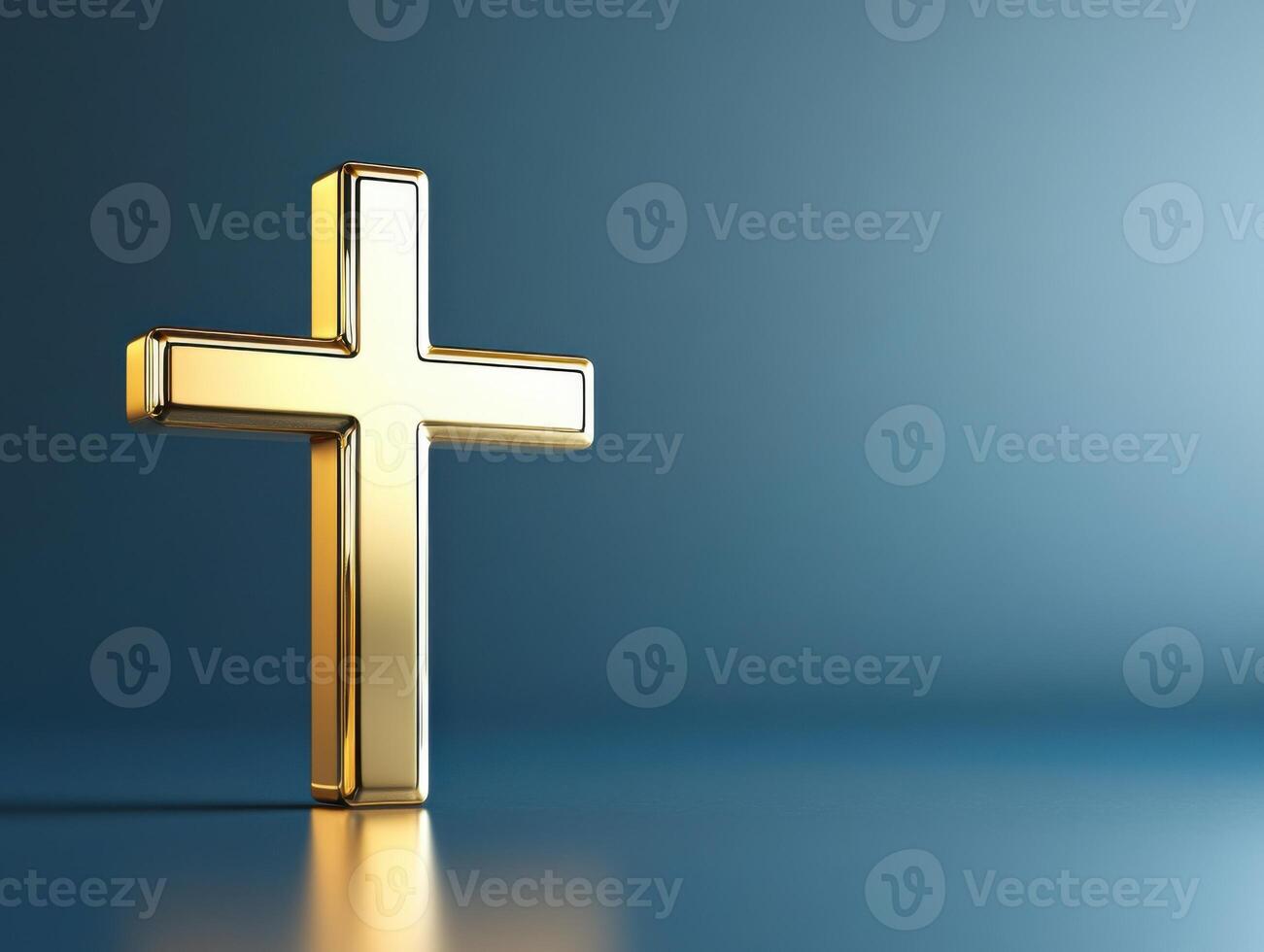 Golden cross resting on a reflective surface with a soft blue background at a serene setting photo