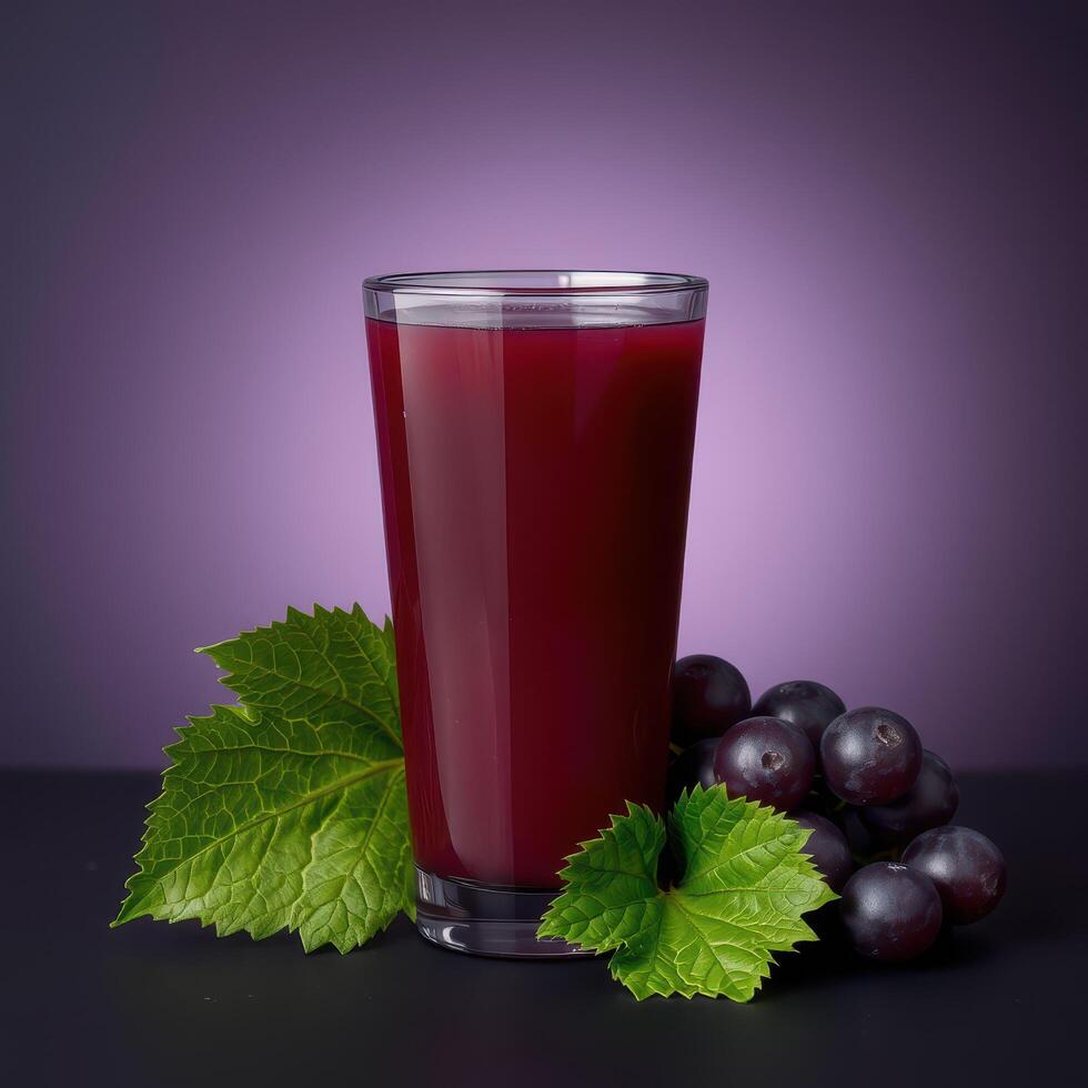 Refreshing Grape Juice with Ripe Grapes and Leaves photo
