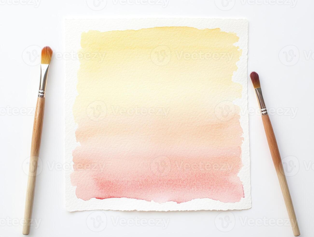 Soft and serene watercolor gradient on paper with brushes for artistic inspiration photo