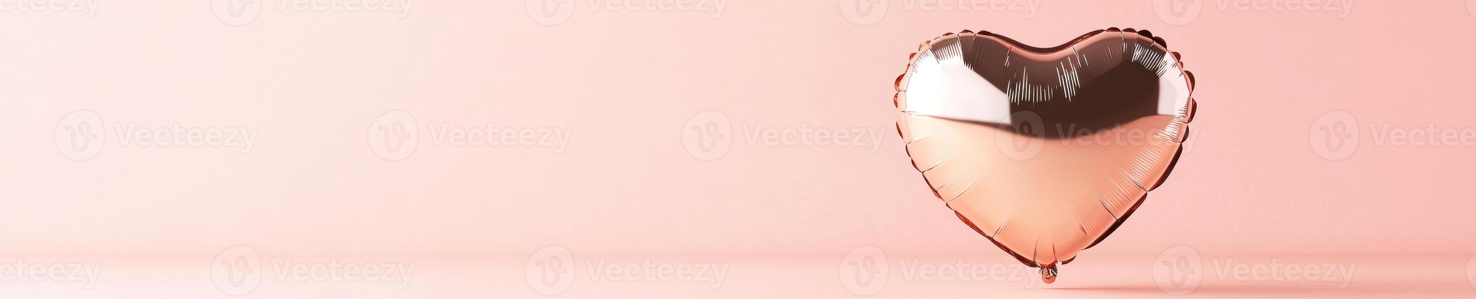 Metallic rose heart balloon on soft pink background for romantic celebrations and event decor photo