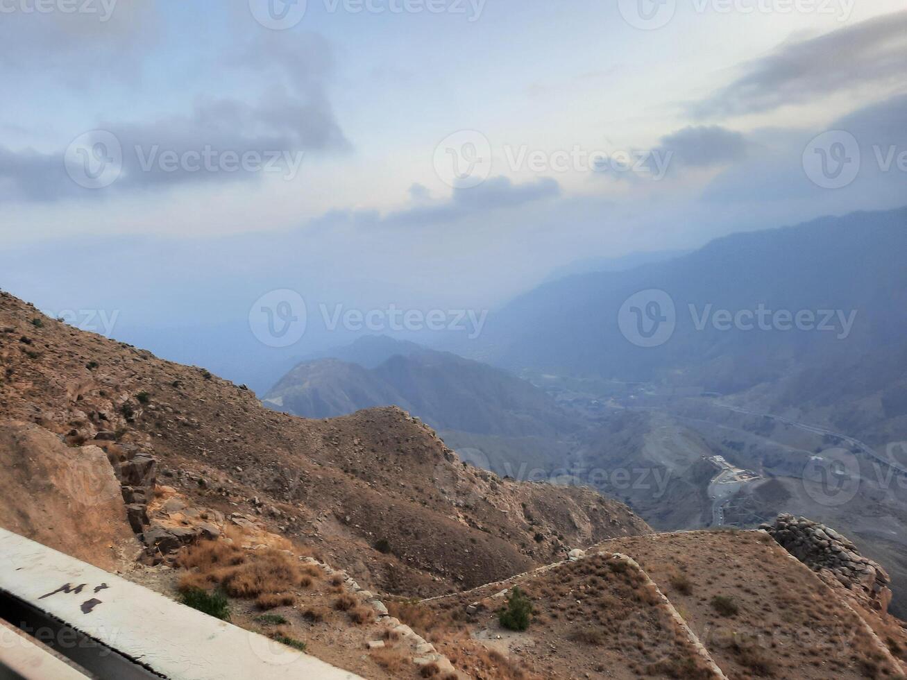 Breathtaking sunset panorama of the hills surrounding Abha city as seen from High City, Abha. photo