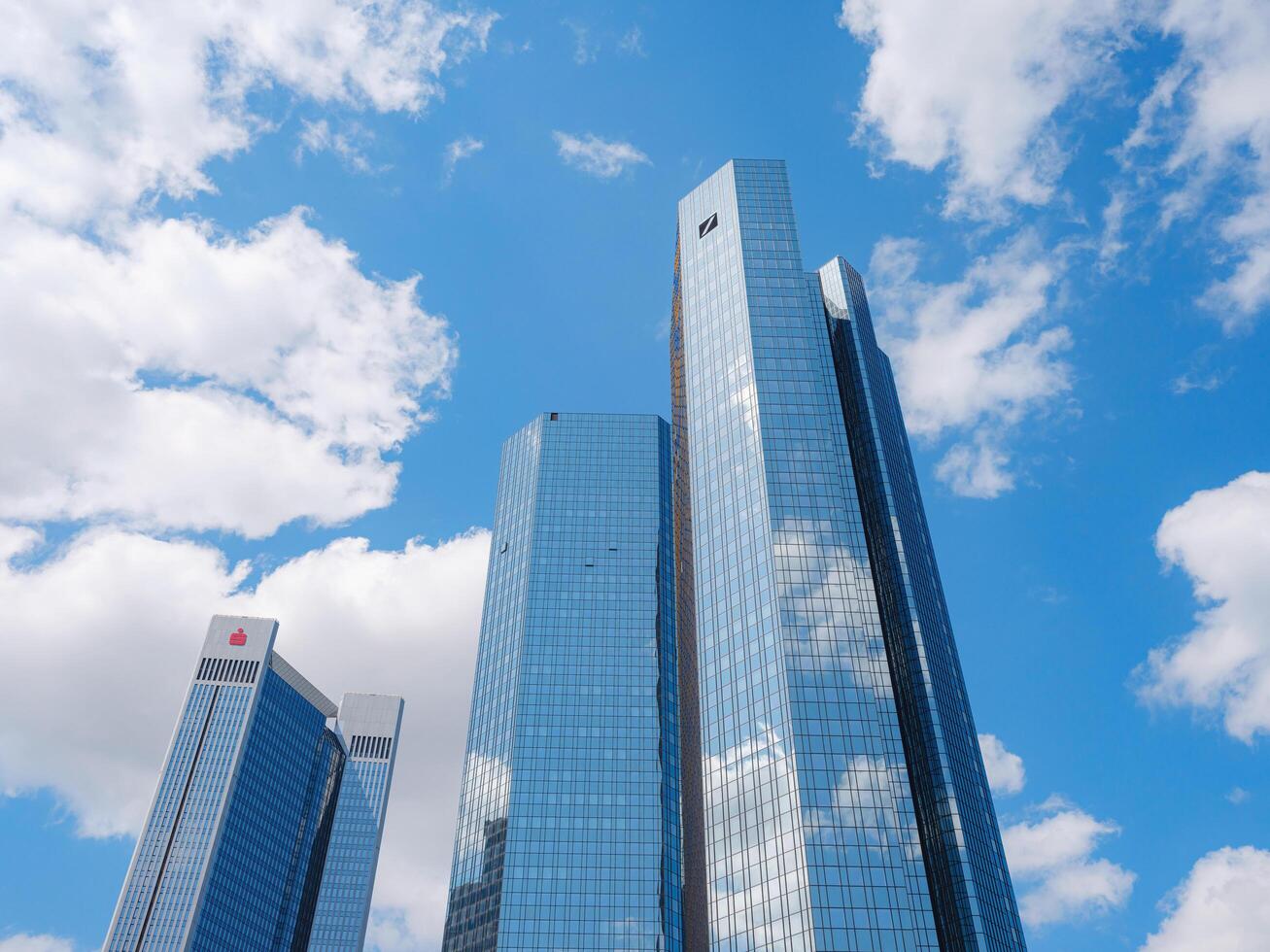 Frankfurt, Germany May 18, 2023. Bottom view of modern skyscrapers in business district in day light in Frankfurt photo