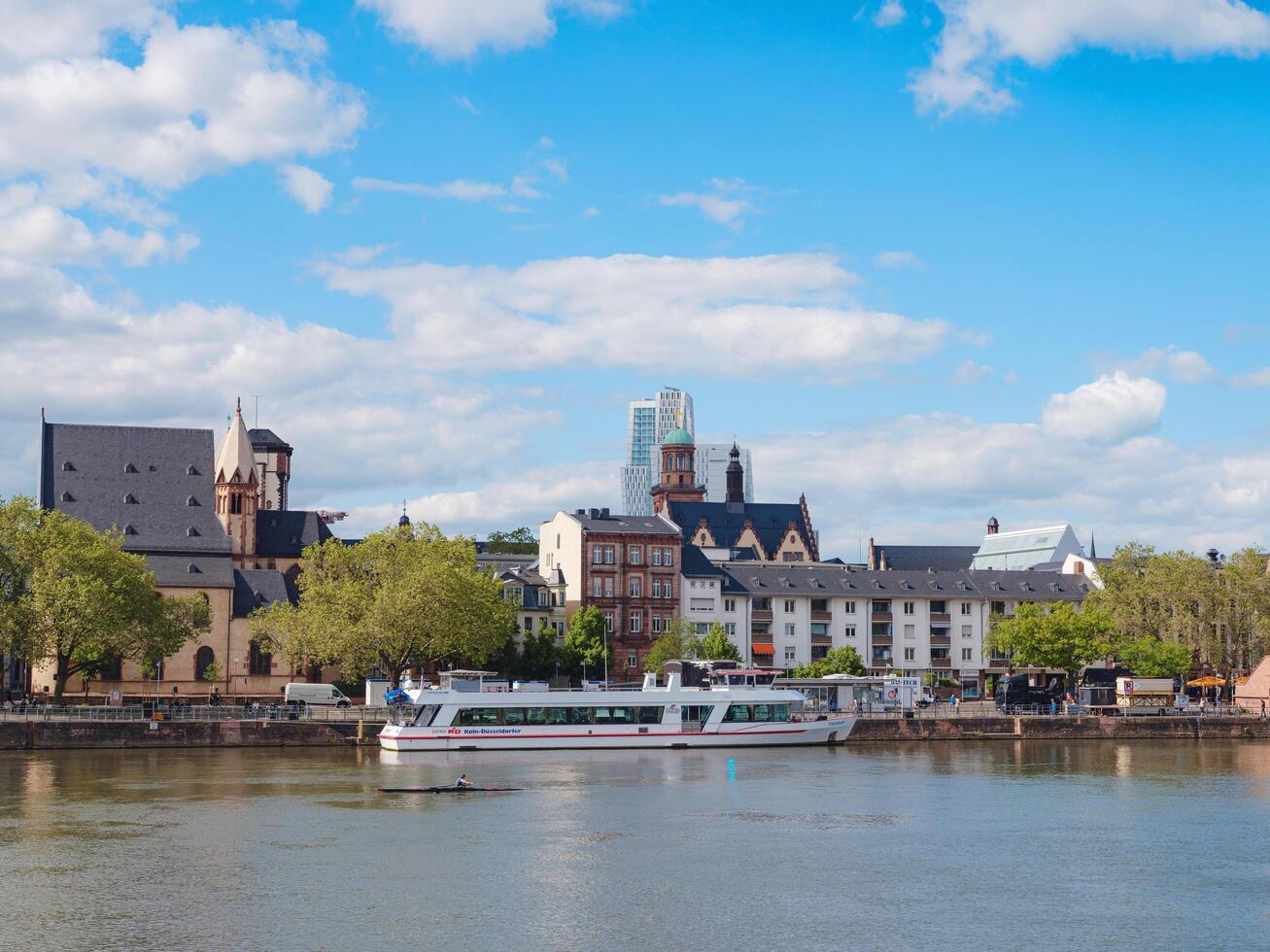 Frankfurt, Germany - May 19, 2023. Frankfurt am Main city skyline on a bright sunny summer day, Germany. Main river, Hessen, Hesse, Germany photo