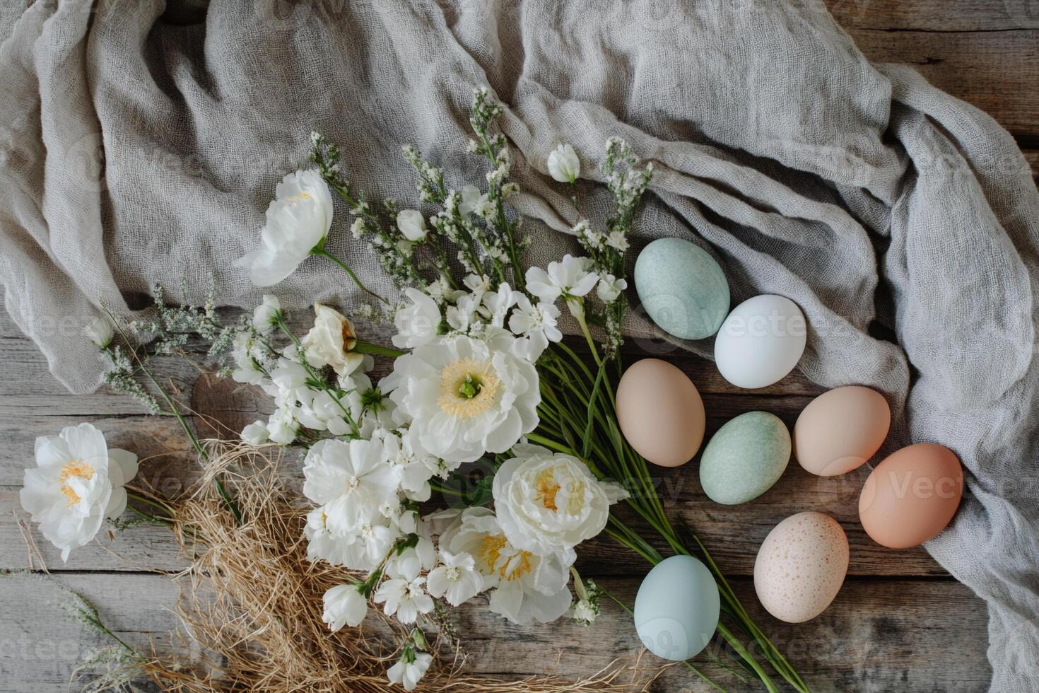 Beautiful Easter eggs with golden accents and rosemary twigs. Elegant spring celebration, minimalist festive styling, fresh seasonal arrangement, stylish decor. photo