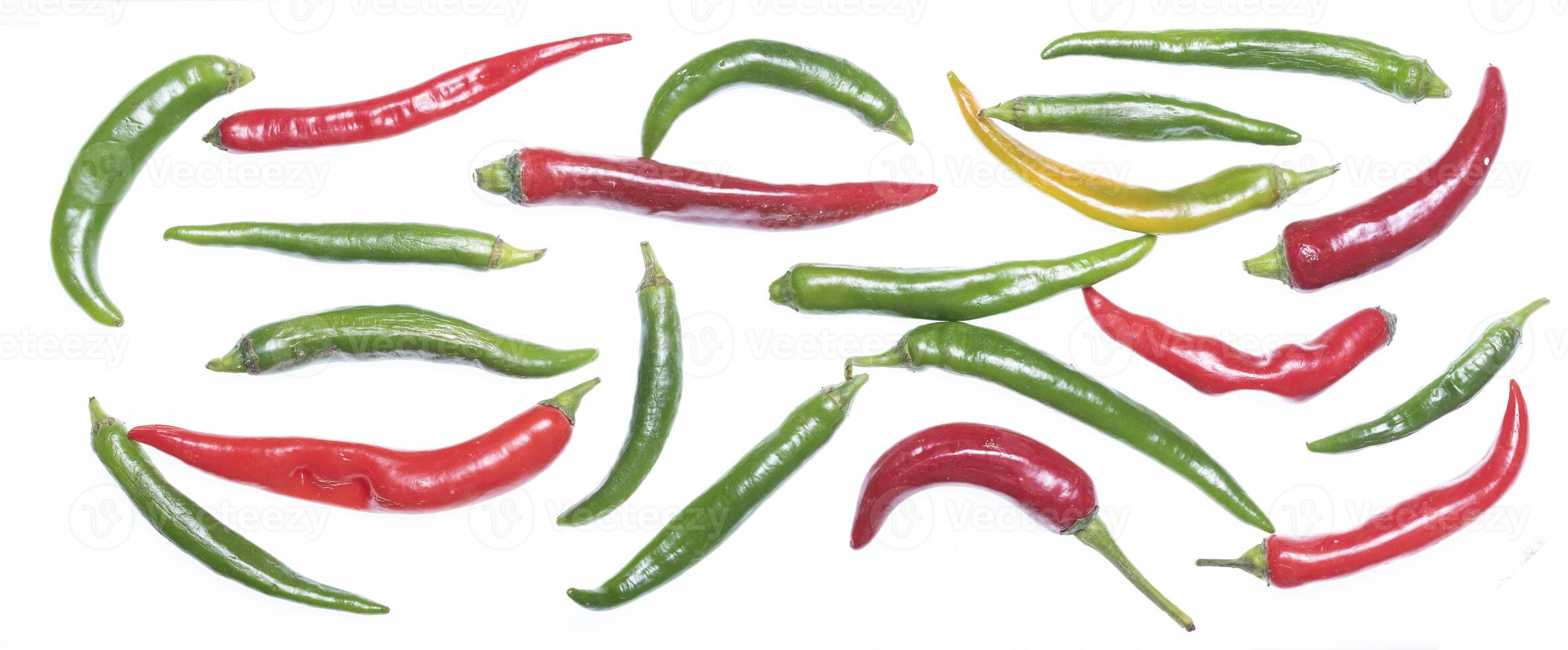 small red and green pepper on white photo