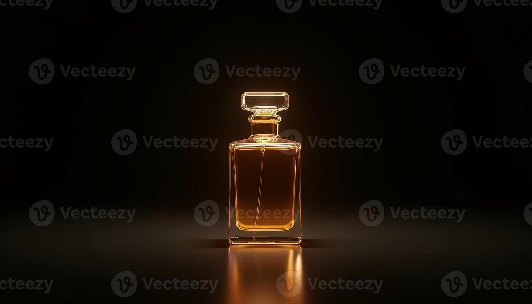 Elegant glass perfume bottle illuminating a dark background with warm hues photo