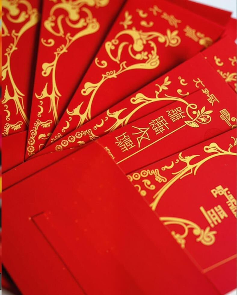 Elegant Red Envelopes with Gold Designs for Festive Celebrations photo