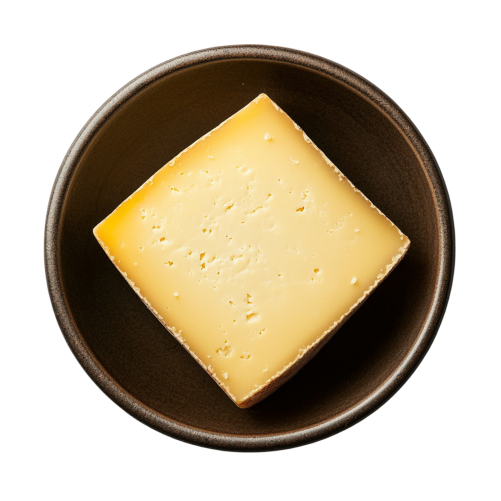 a piece of cheese in a bowl on a table transparent background. png