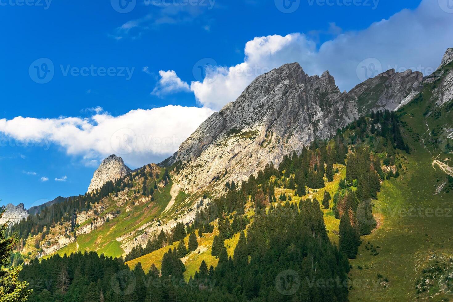 Tops of the mountans lit by the sun in Haute-Savoie, France photo