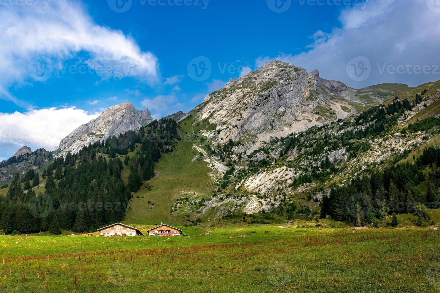wooden house of the farmer in the mountains in La Cluzas photo