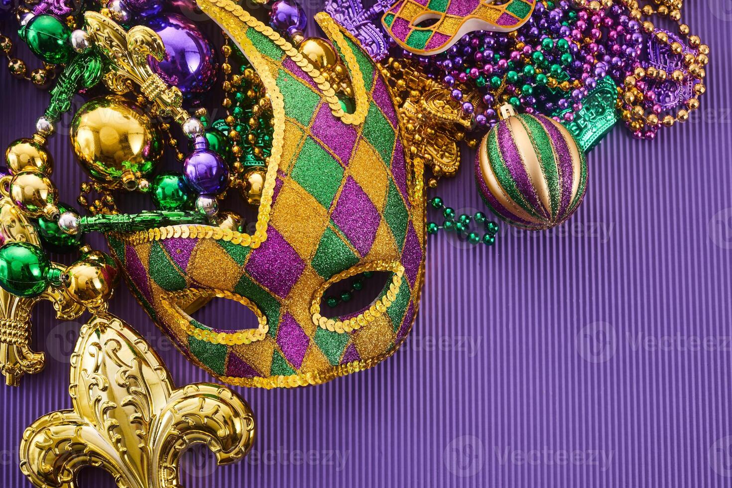 Mardi Gras Celebration. Colorful Mardi Gras mask and beads photo