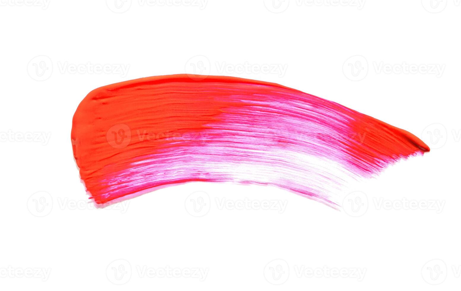 Vibrant red and pink paint brush stroke on white background showcasing smooth artistic texture and color blend. photo
