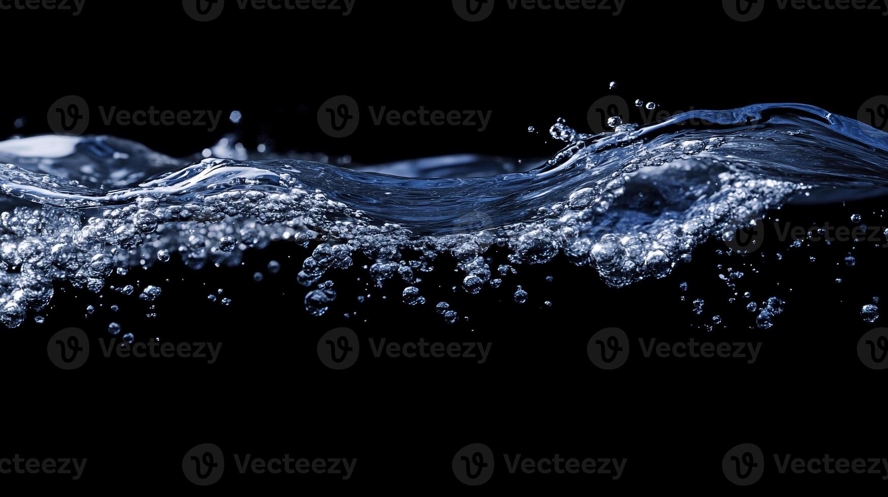 Close-up of blue water waves with bubbles against a black background. photo