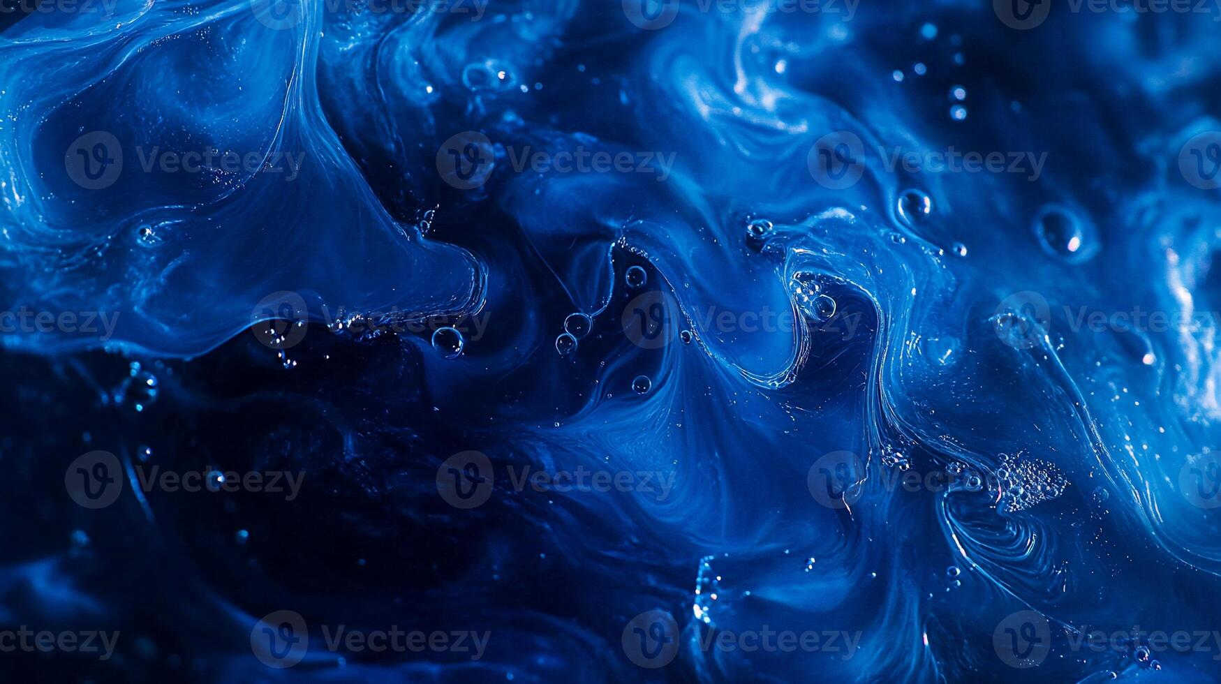 Abstract blue liquid swirls with bubbles, creating a mesmerizing pattern. photo