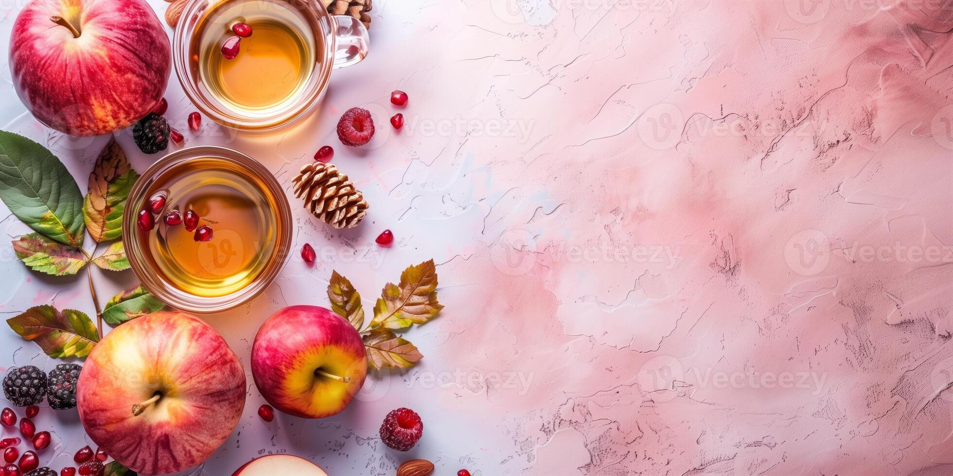 Apples and honey on a pink background, top view, for Rosh Hashanah celebration, copy space photo