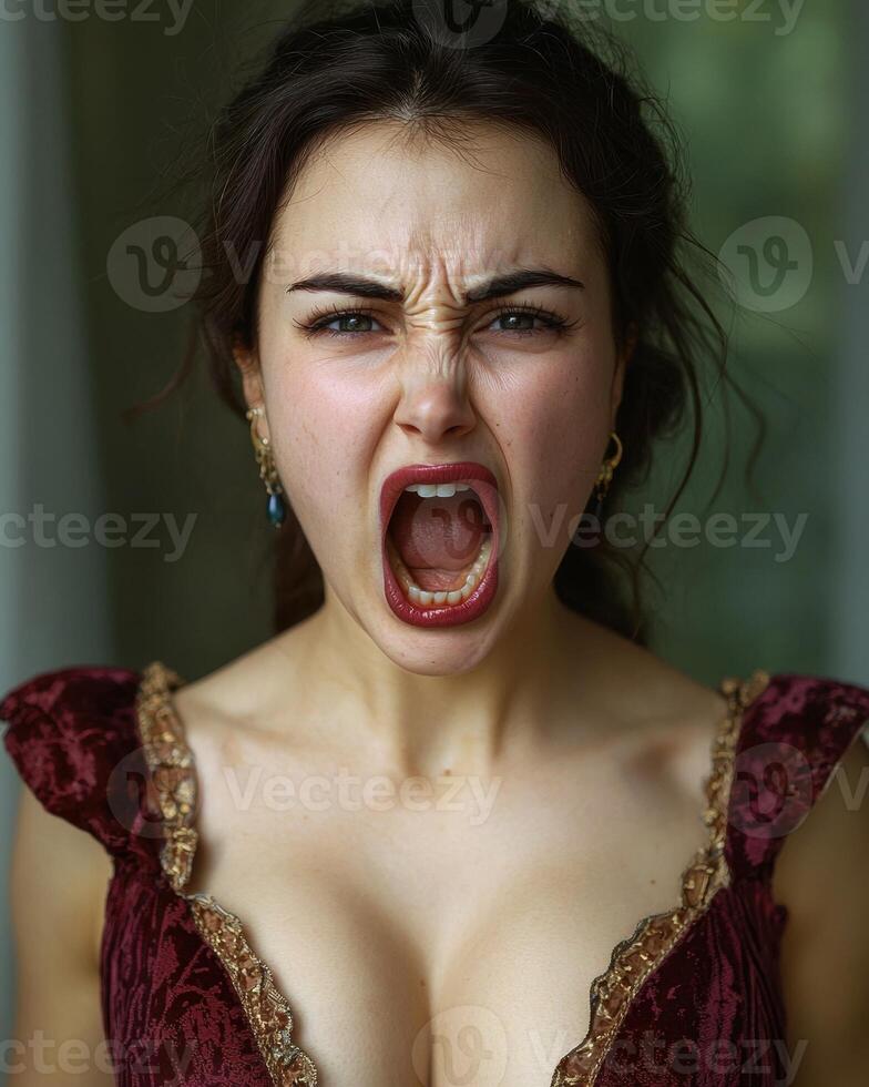 Woman screaming in anger and frustration photo