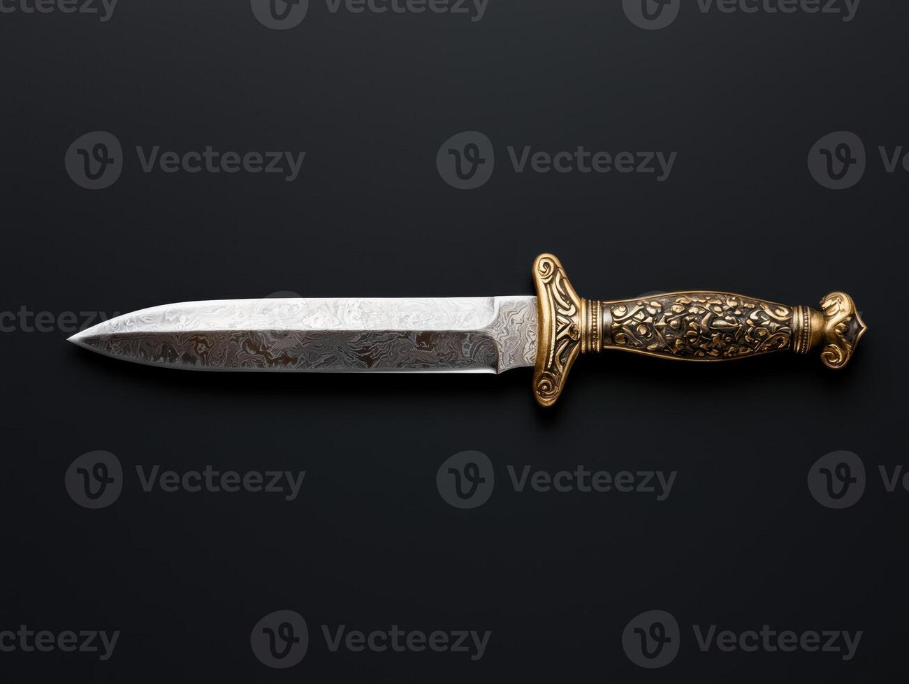 Ornate dagger with damascus steel blade on black background photo
