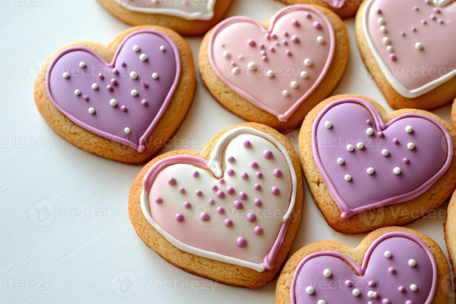 Heart shaped cookies decorated with icing and sprinkles creating a delightful treat photo