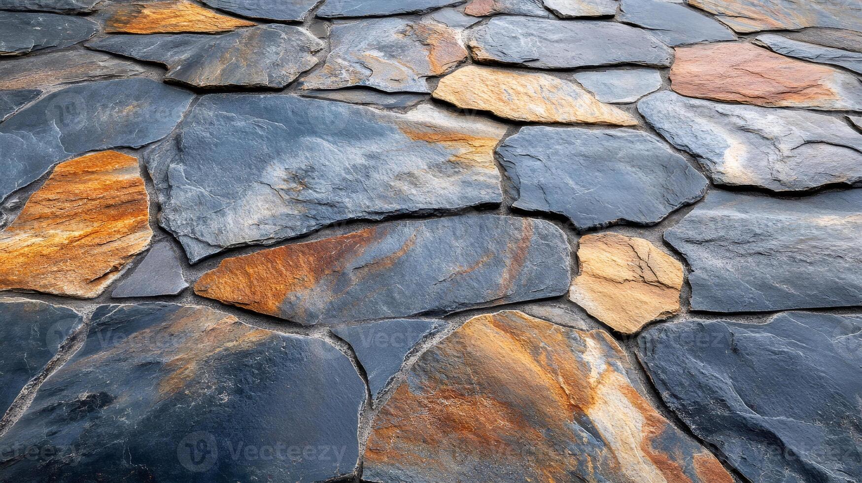 Stone wall cladding showing textured surface with colorful veins photo
