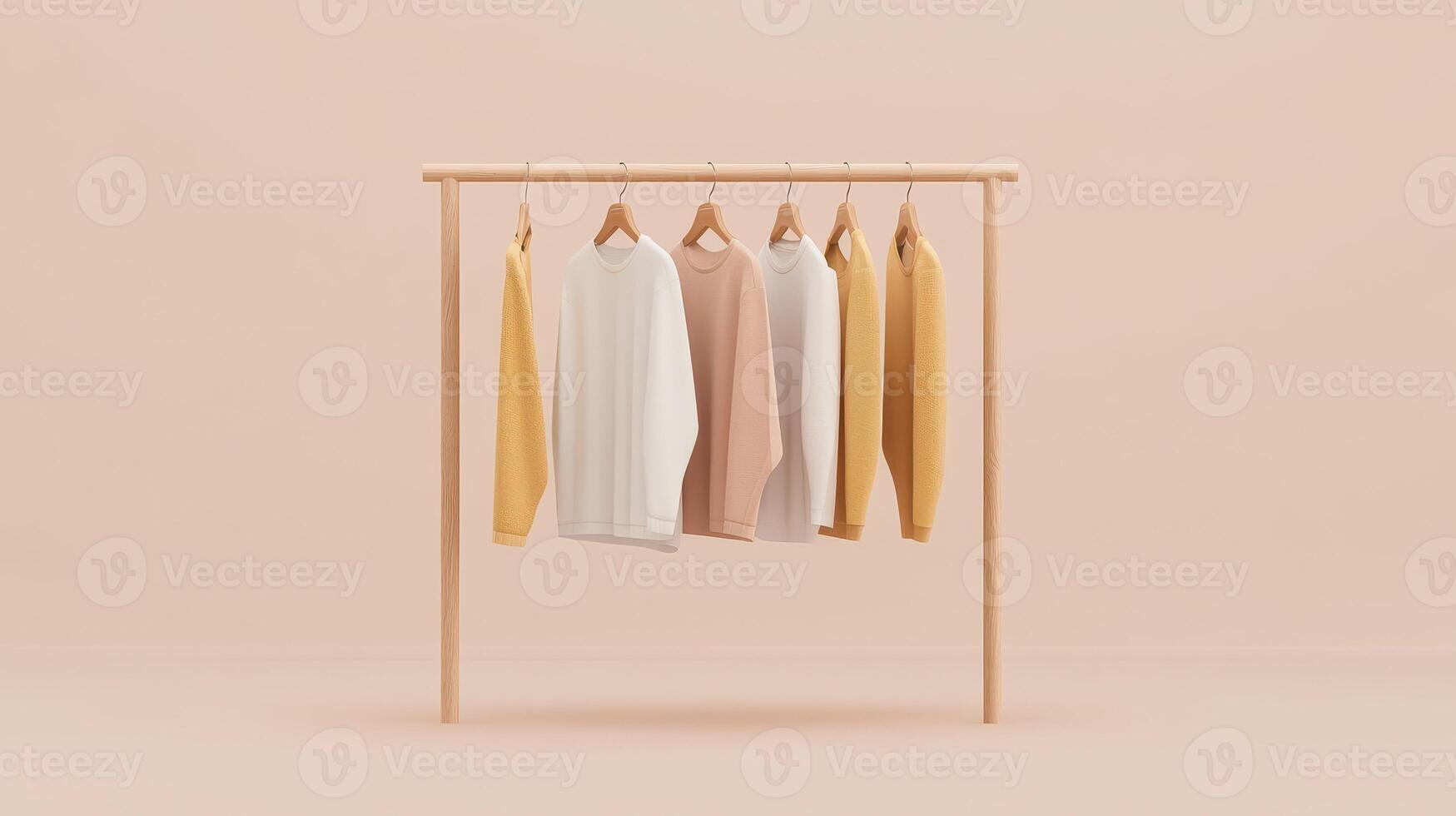 Clothes hanging on a wooden rack on a beige background photo