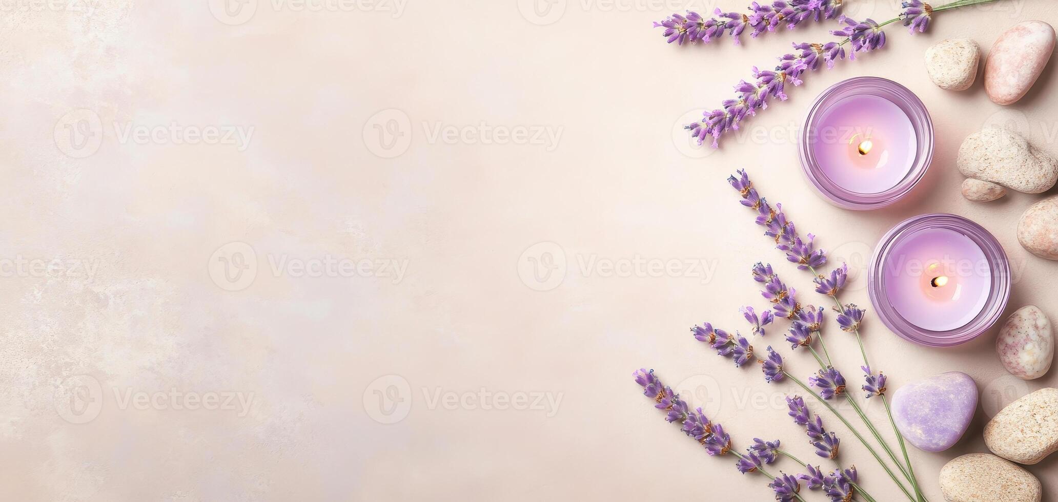 Relaxing spa background featuring lavender flowers, candles, and smooth stones. This serene composition creates calming atmosphere perfect for wellness and self care photo