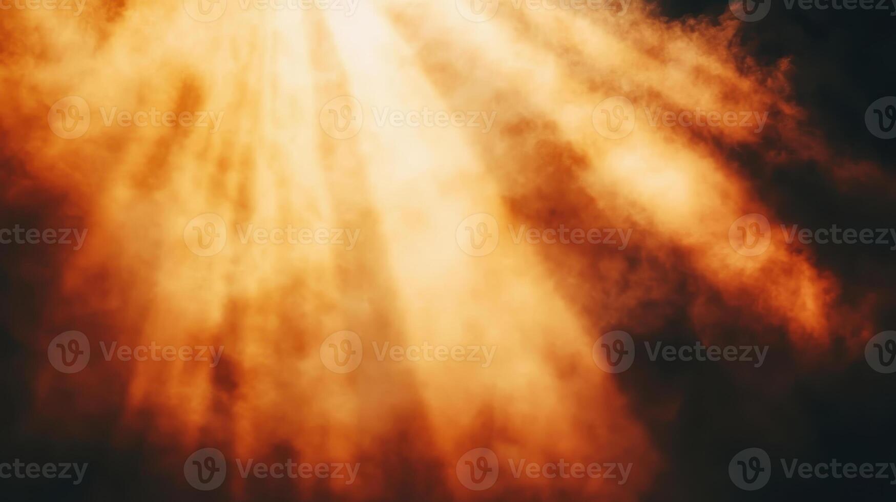 Vibrant golden hour sunlight shining through thick clouds creates dramatic atmosphere. interplay of light and shadow evokes sense of warmth and tranquility photo