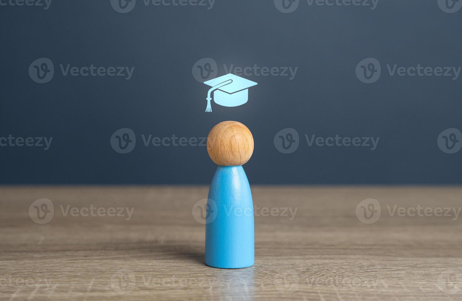 A man with a graduate cap symbol, the concept of getting an education and graduating from training. Reach graduation. Development paths and subsequent stages. Choose a new direction for learning. photo
