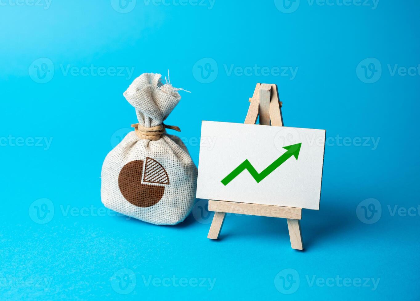 Money bag with budget and up arrow. Rise in profits, budget fees. Increase in the deposit rate. Inflation acceleration. Investments. Increase income and business efficiency. Economic growth, GDP. photo