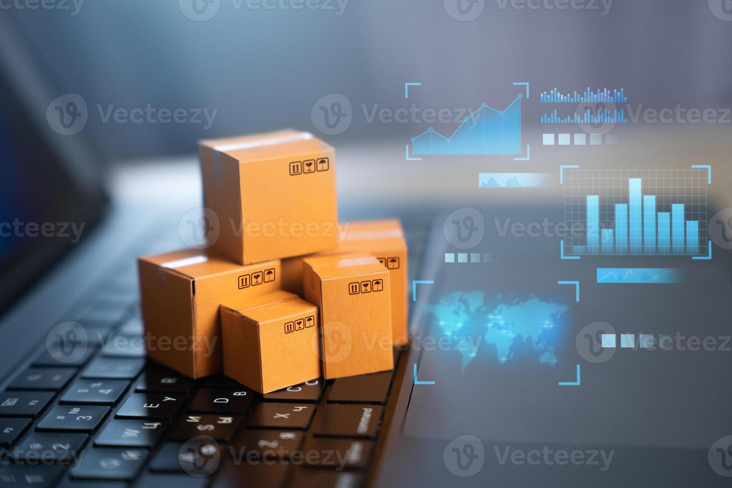 Boxes on a laptop with graphs and charts. Internet trade, online orders. Import or export. Delivery and logistics. Shopping. Commerce and Economics. photo