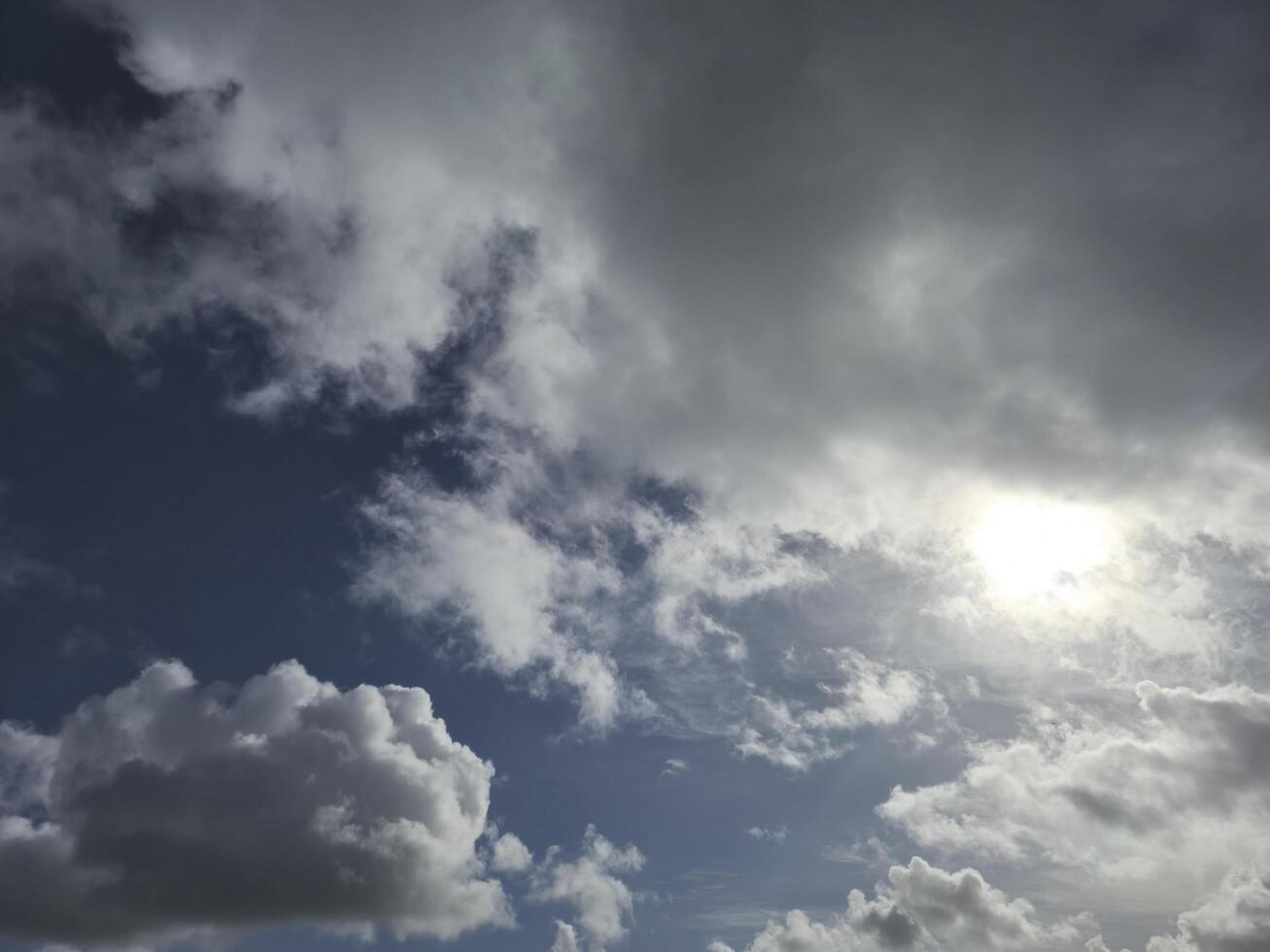 Cumulus Clouds in a Natural Landscape at Horizon photo