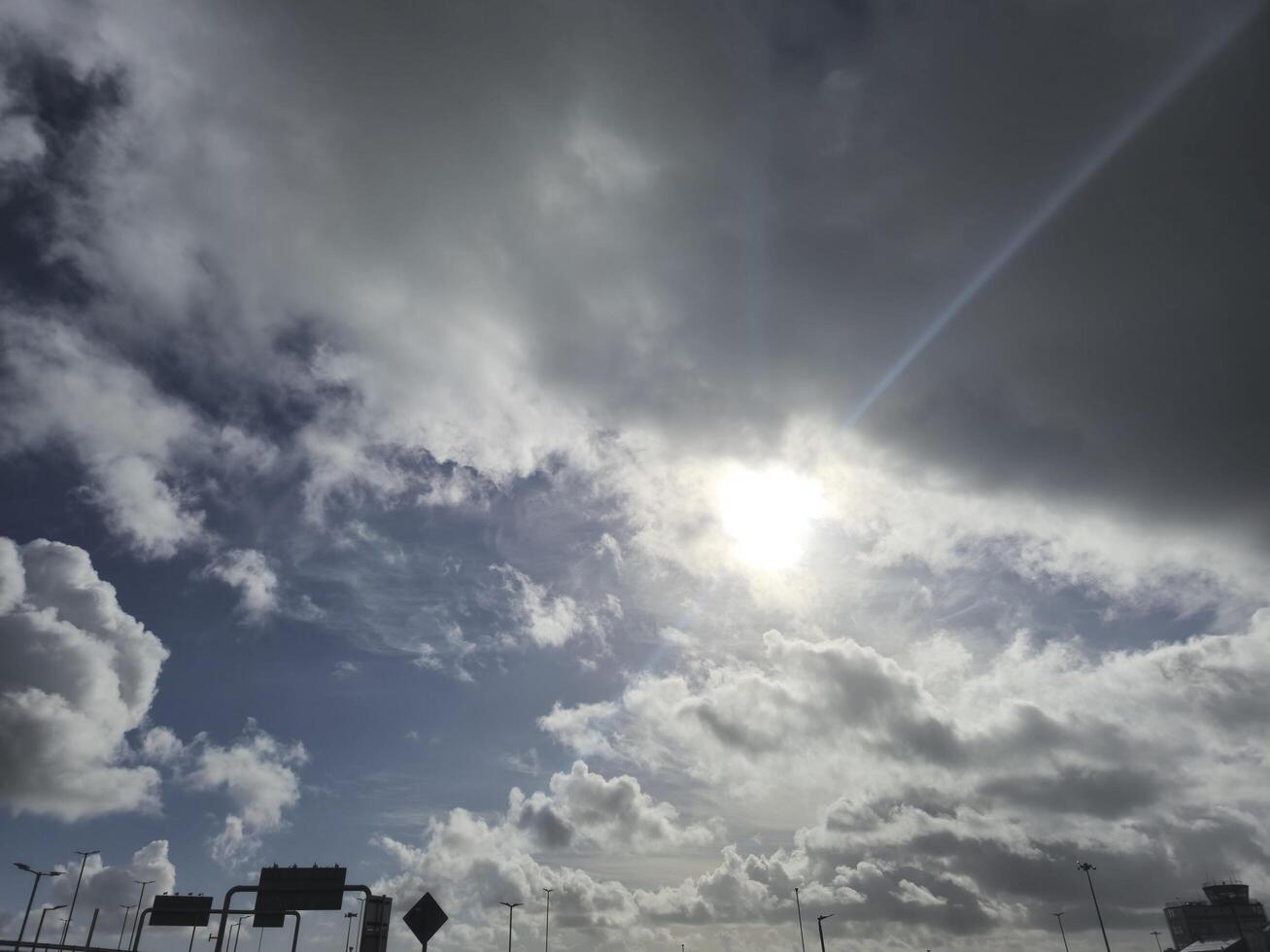 Cumulus Clouds in a Natural Landscape at Horizon photo