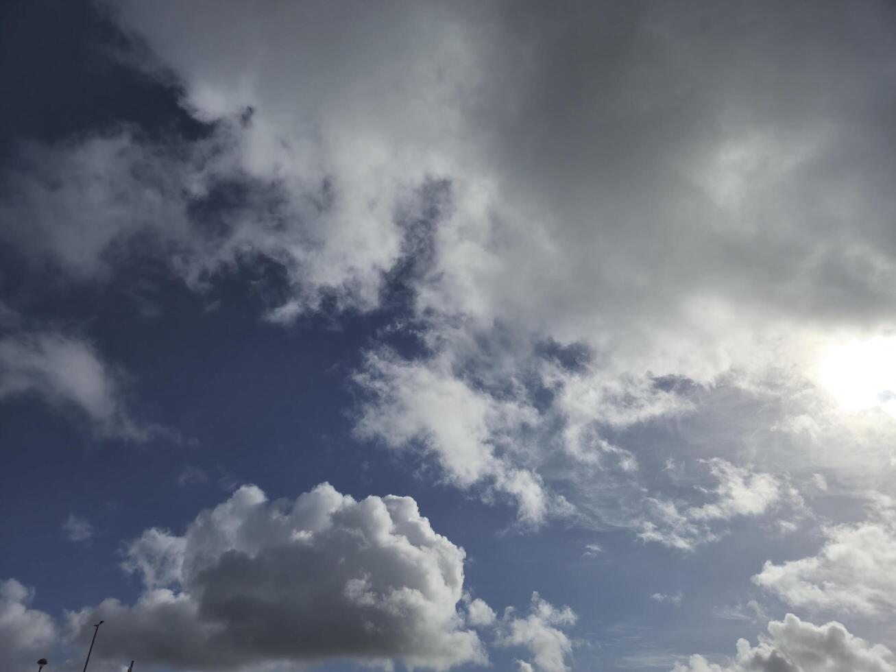Cumulus Clouds in a Natural Landscape at Horizon photo