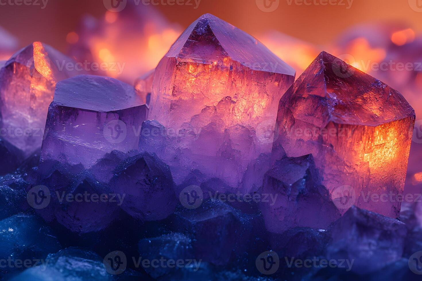 Vibrant Amethyst Crystals with Warm Glowing Light - Nature's Gemstone Beauty photo