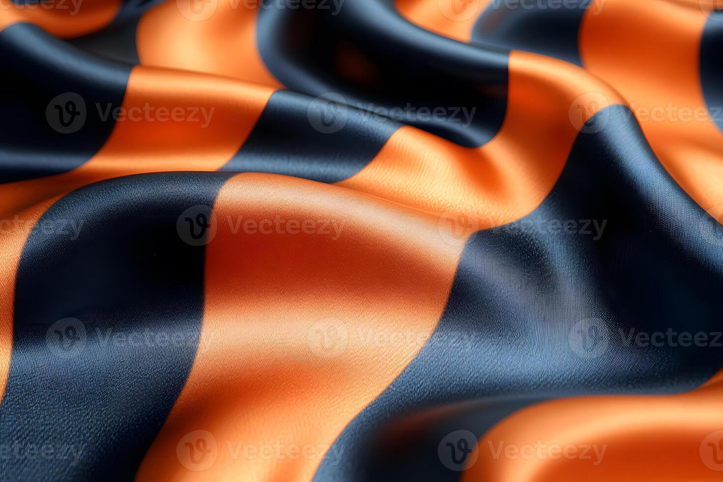 Abstract Black and Orange Wavy Fabric Texture Vibrant Textile Design for Fashion and Decor photo