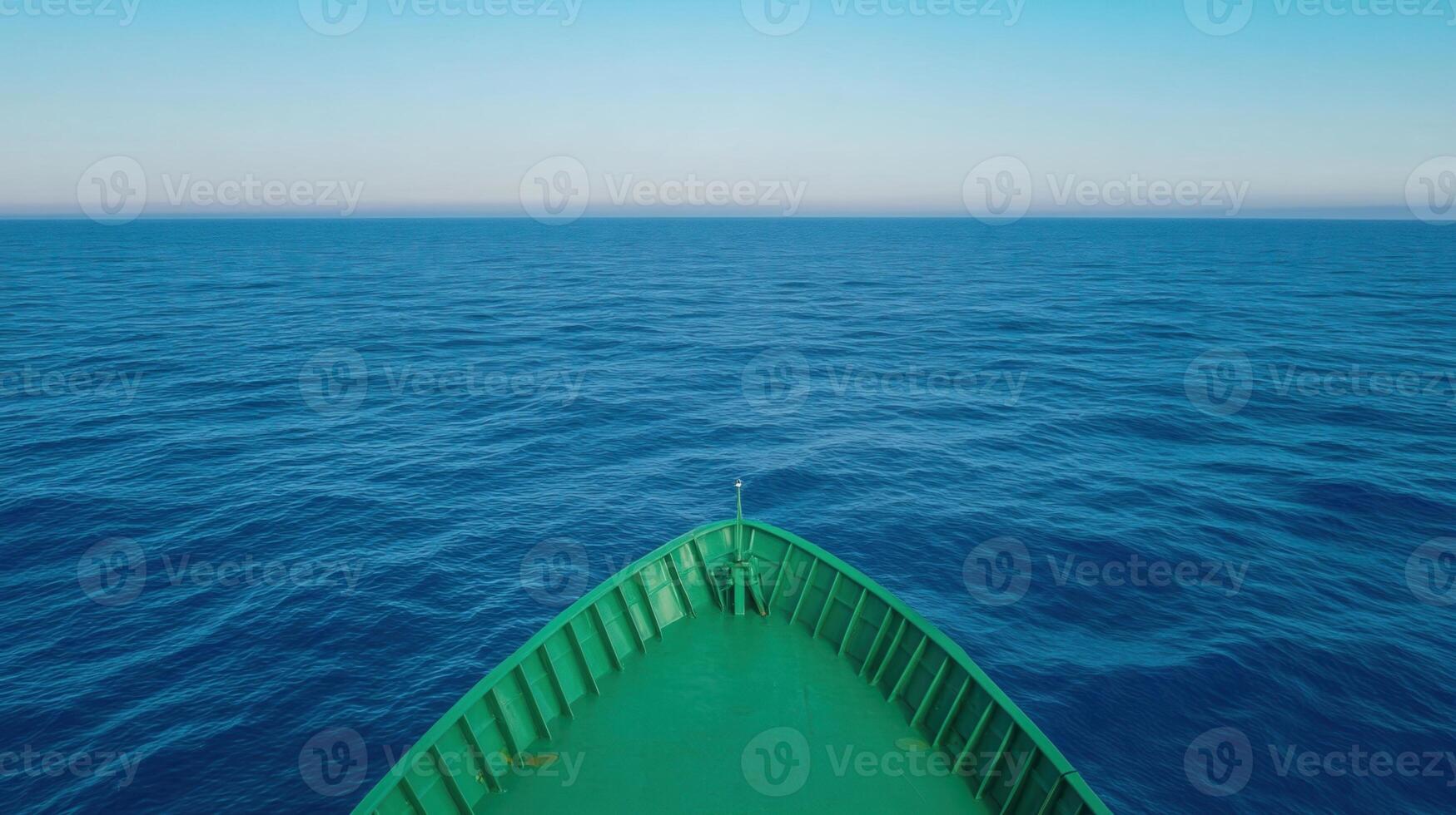 Green Ocean Horizon Viewed from Vessel Deck with Blue Sky and Calm Waters, Ideal for Marine Exploration and Environmental Themes Stock Photography photo