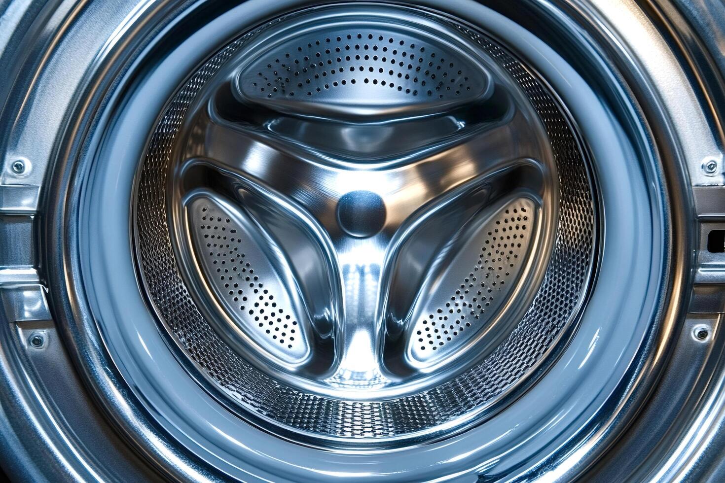 Inside view of washing machine drum showing its cleanliness and functionality photo