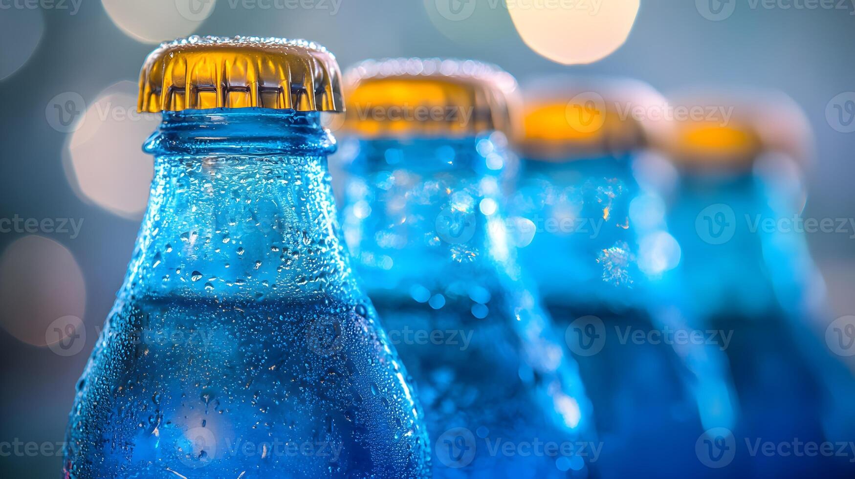 Blue glass soda bottles line up perfectly, displaying carbonated beverages with condensation drops, creating refreshing summer vibes against soft bokeh background. colorful photo