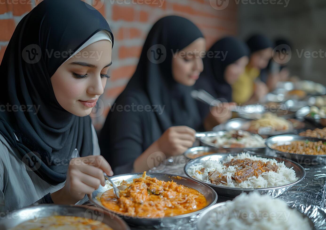 Young Women Enjoying Delicious Meal Together photo