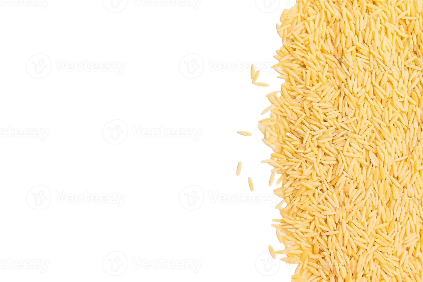 Pile of Uncooked Orzo pasta, raw dry Italian risoni isolated on white background. top view photo